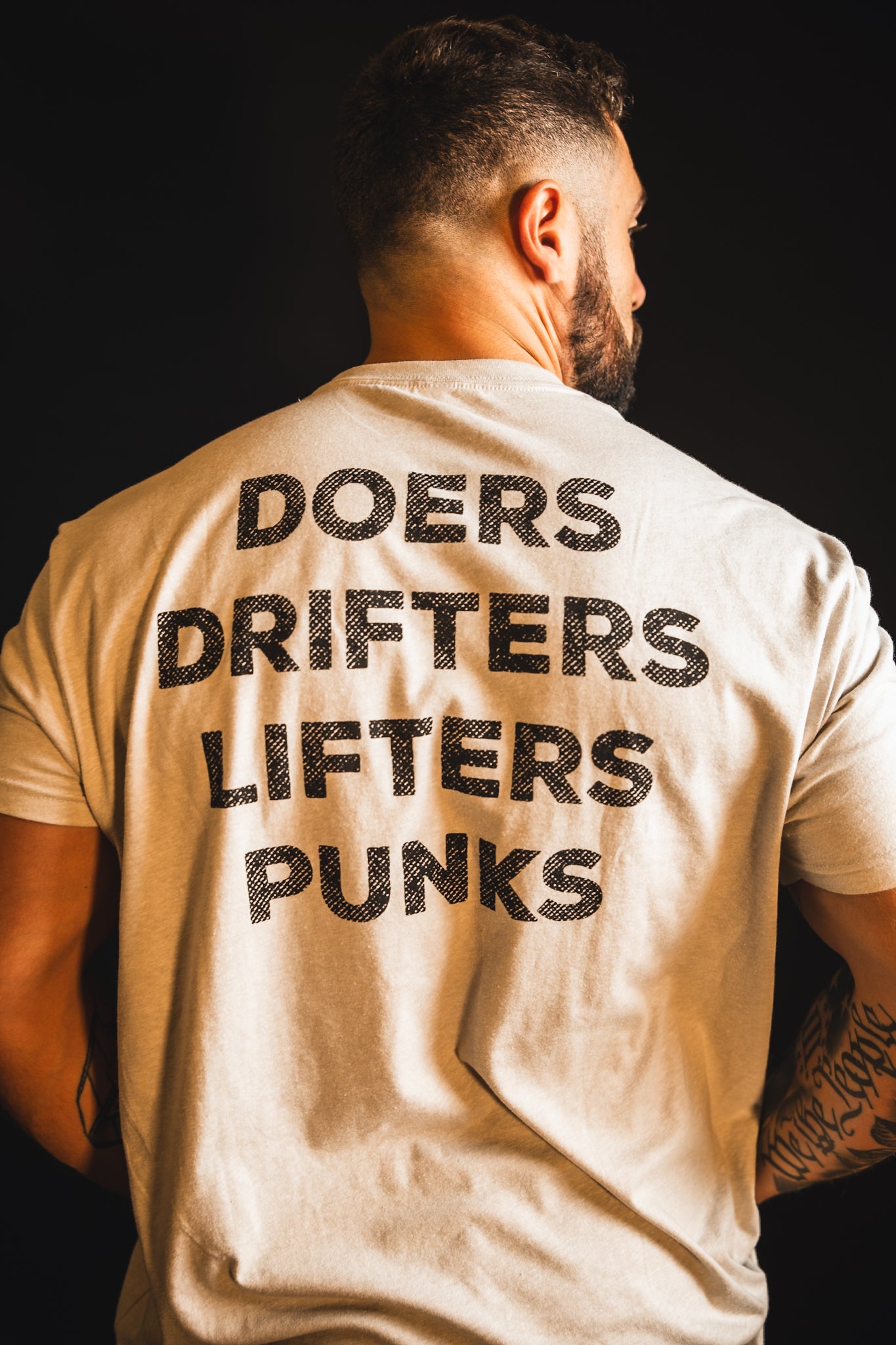 "Doers Drifters Lifters Punks" - Unisex Tee