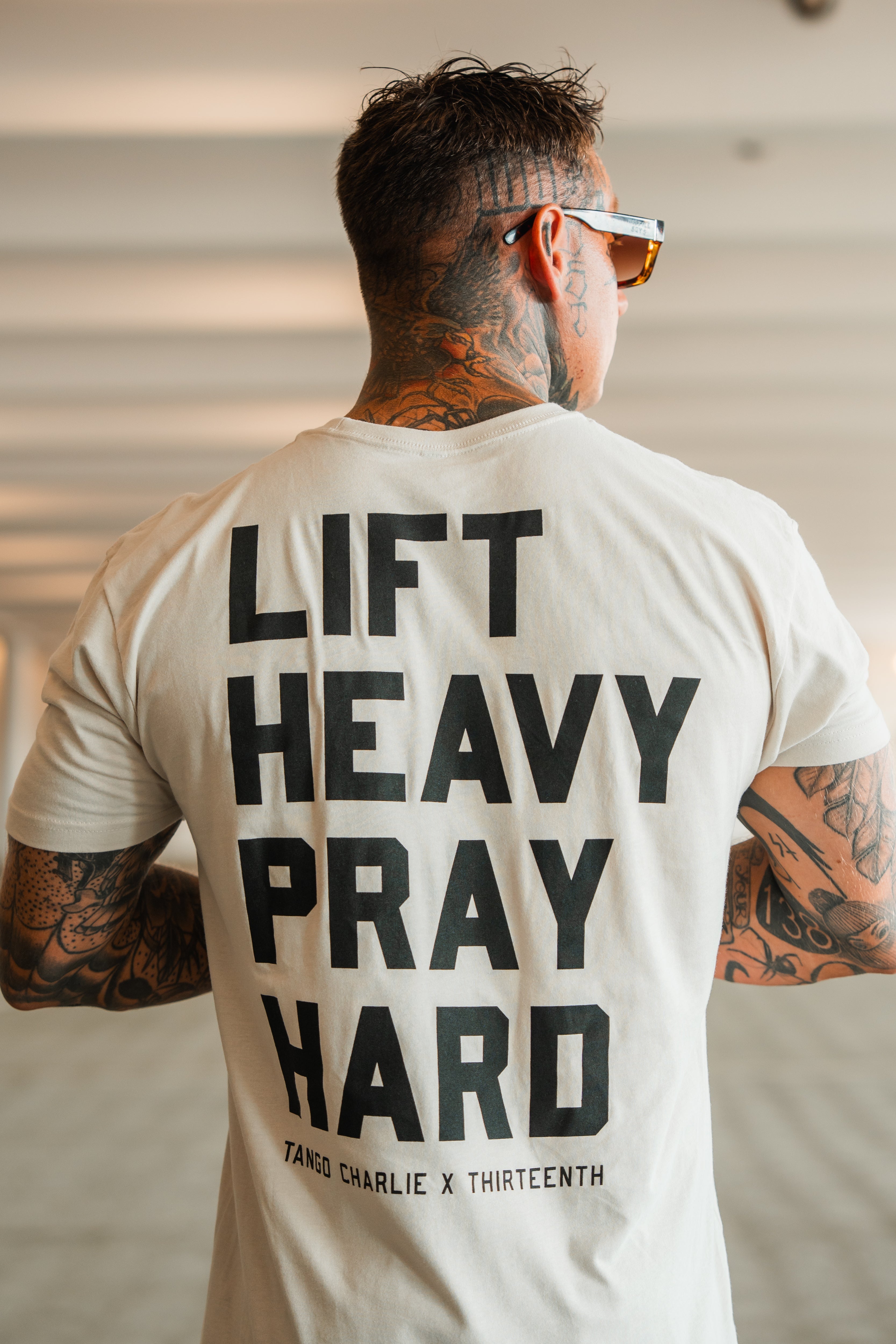 Lift Heavy. Pray Hard. - Tee