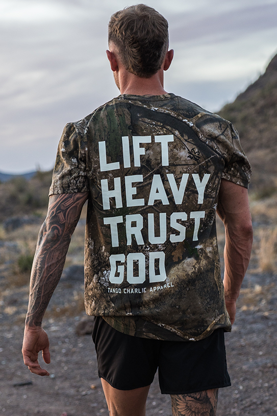 Lift Heavy. Trust God. - Realtree Premium Camo Tee