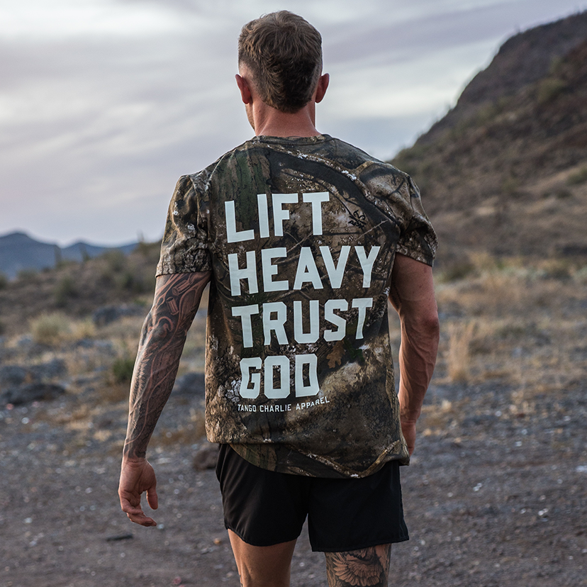 Lift Heavy. Trust God. - Realtree Premium Camo Tee