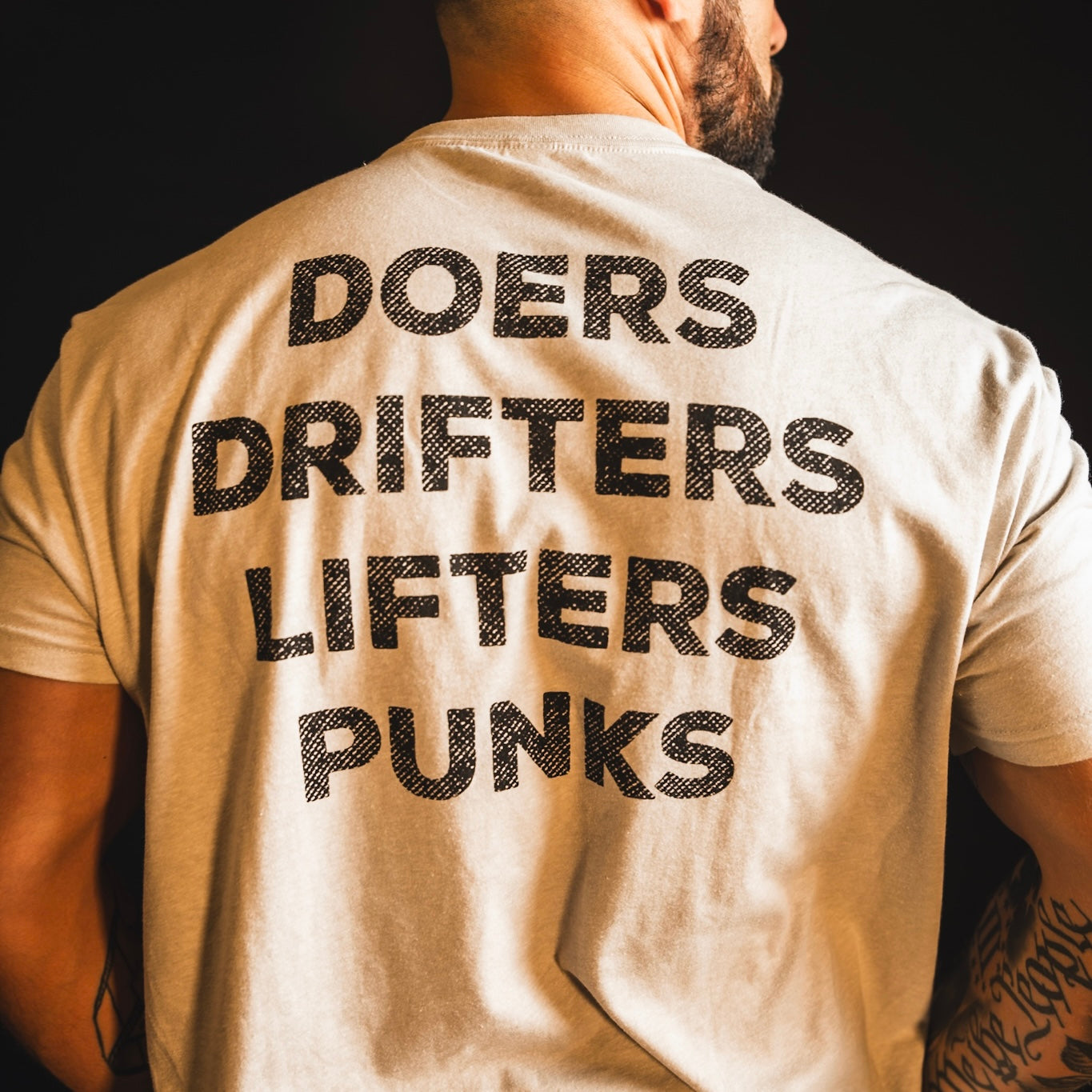 "Doers Drifters Lifters Punks" - Unisex Tee