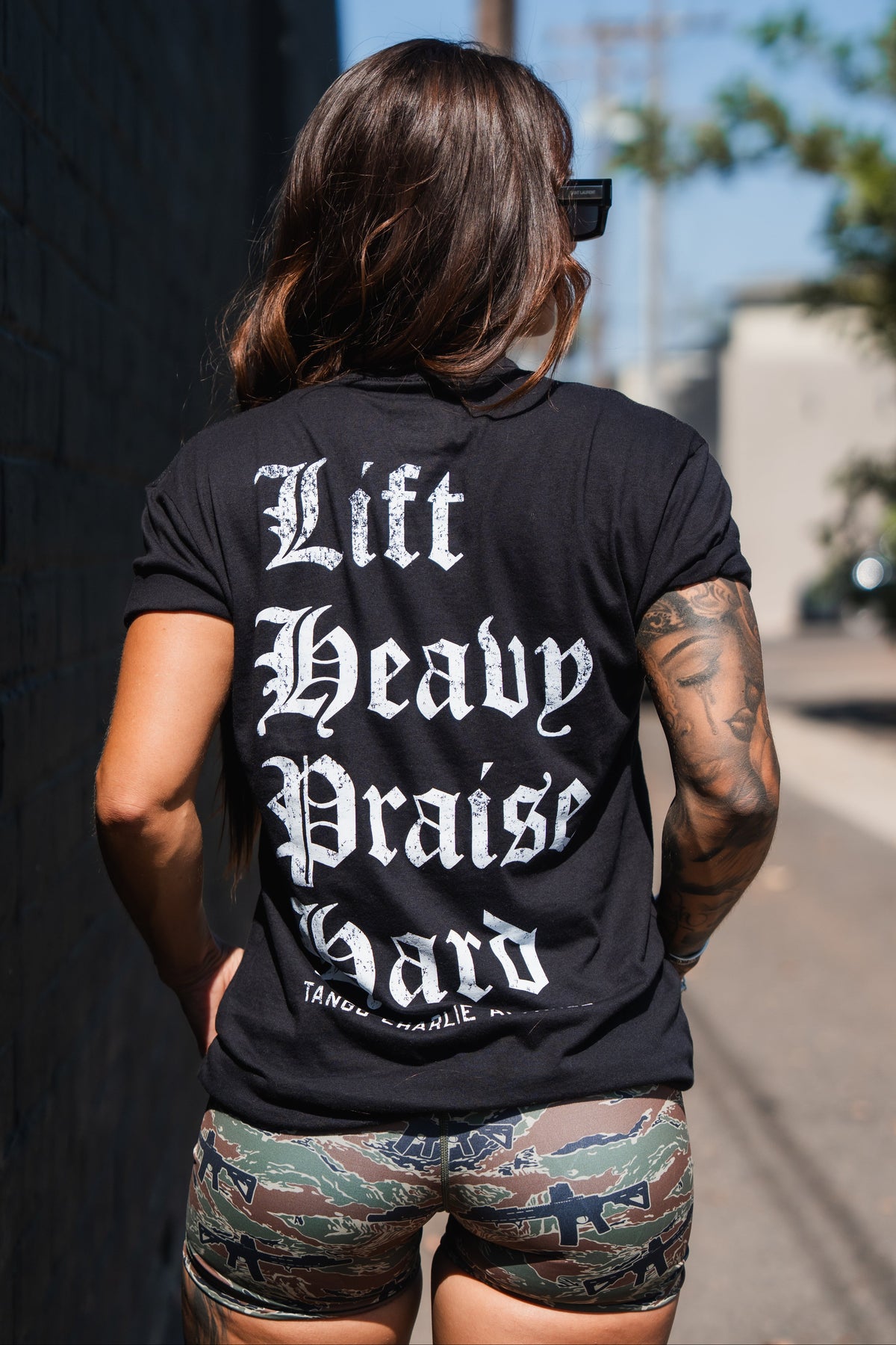 Lift Heavy. Praise Hard. Black Tee