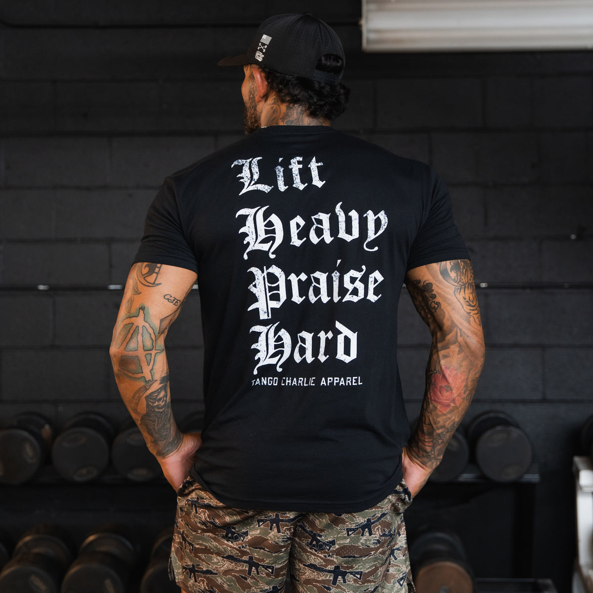 Lift Heavy. Praise Hard. Black Tee