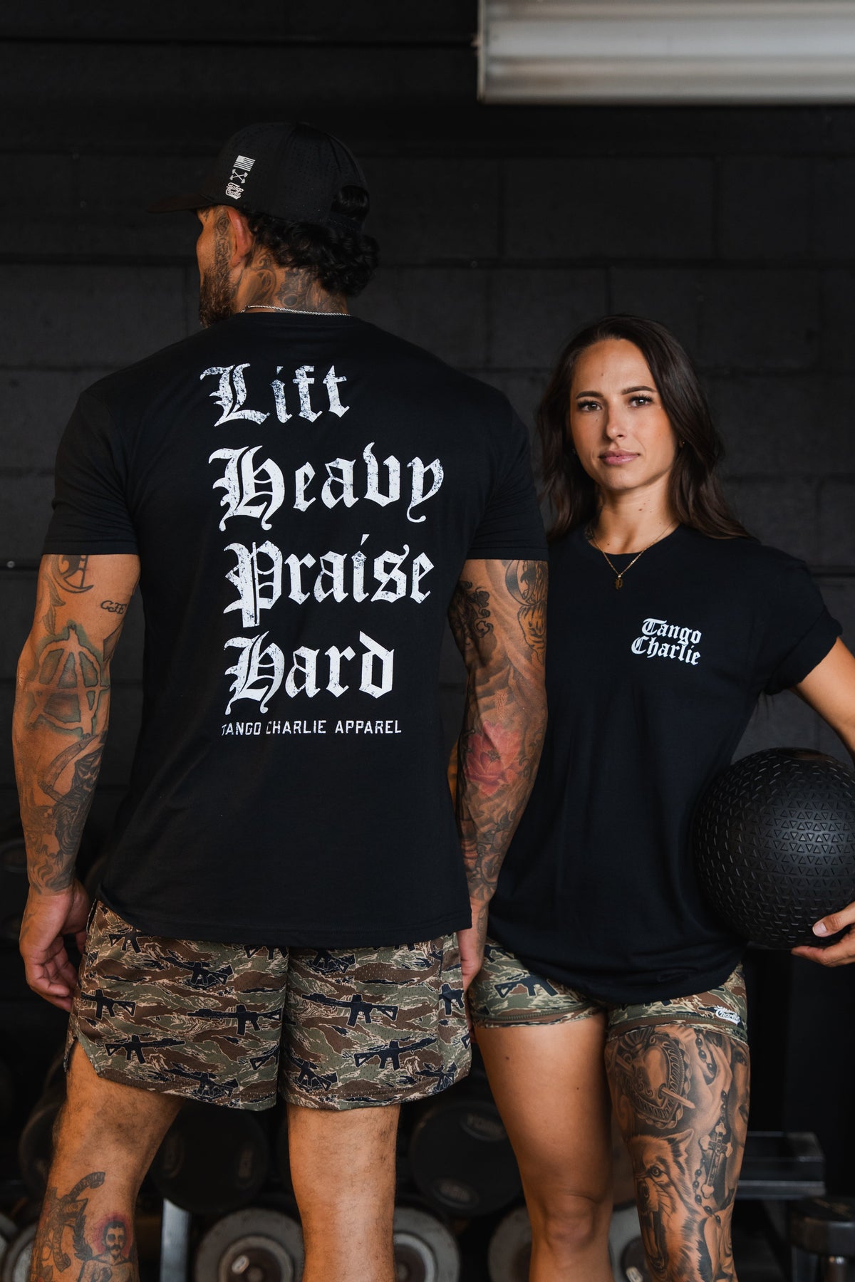 Lift Heavy. Praise Hard. Black Tee