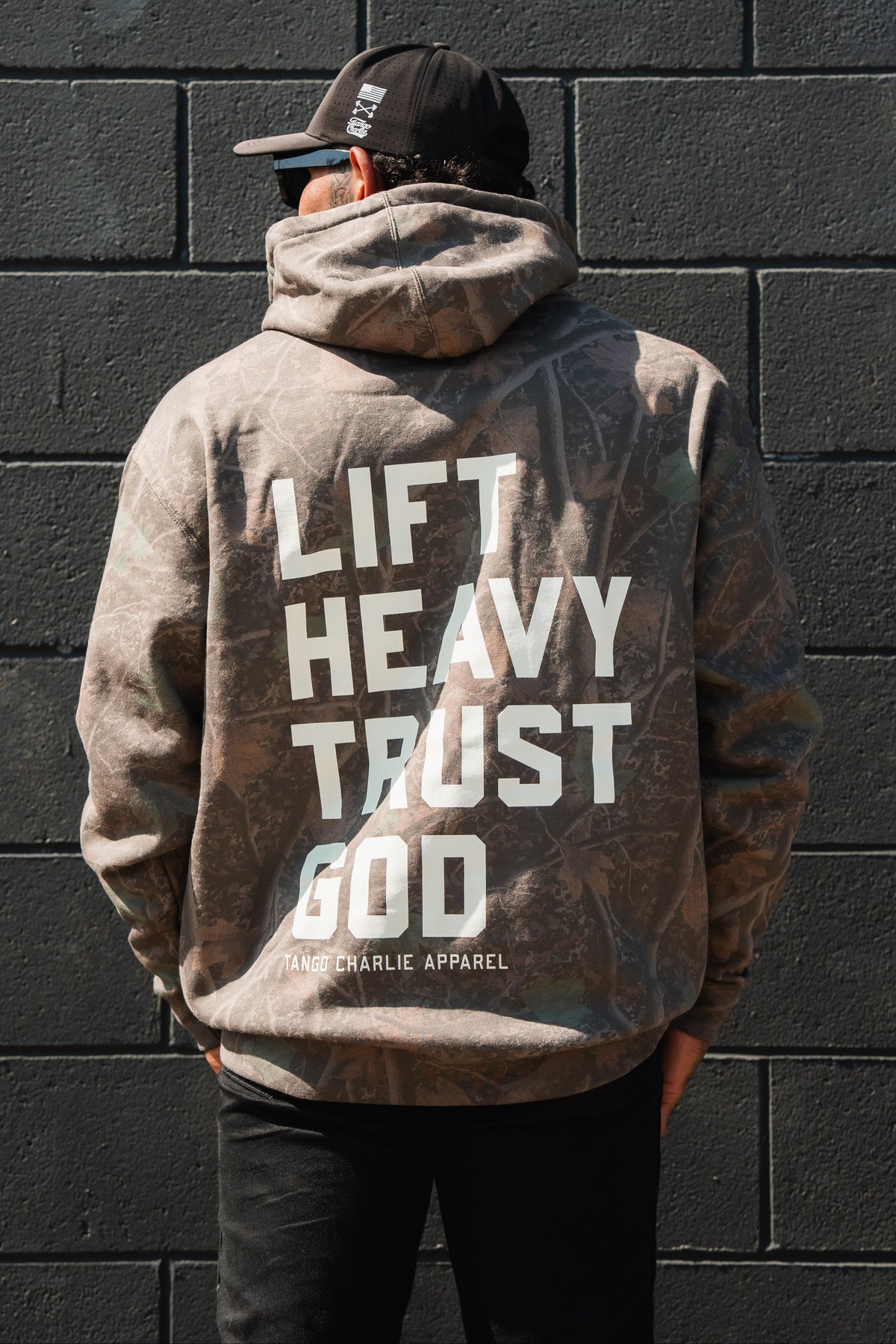 Lift Heavy. Trust God. - Premium Darkwood Camo Hoodie