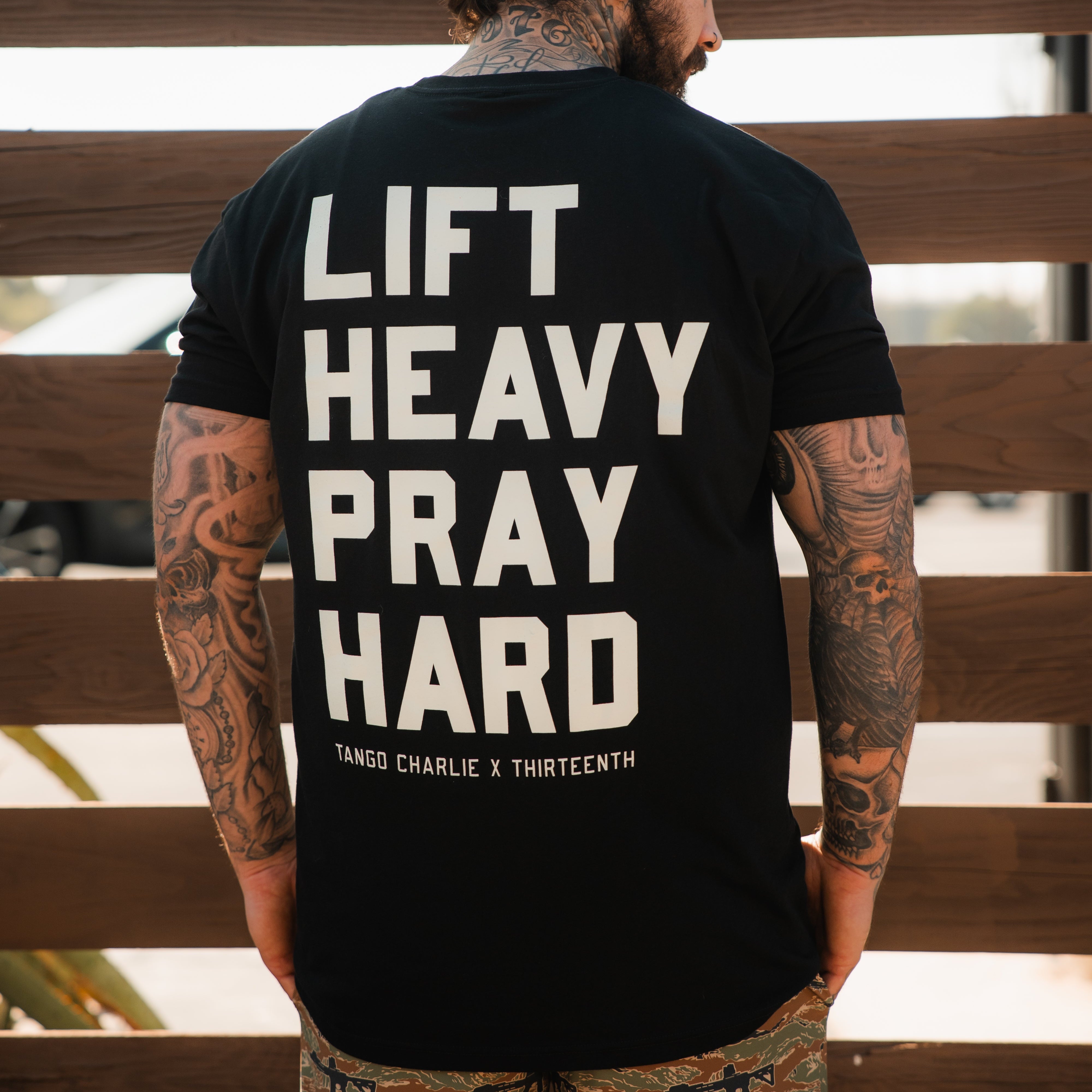 Lift Heavy. Pray Hard. - Black Tee